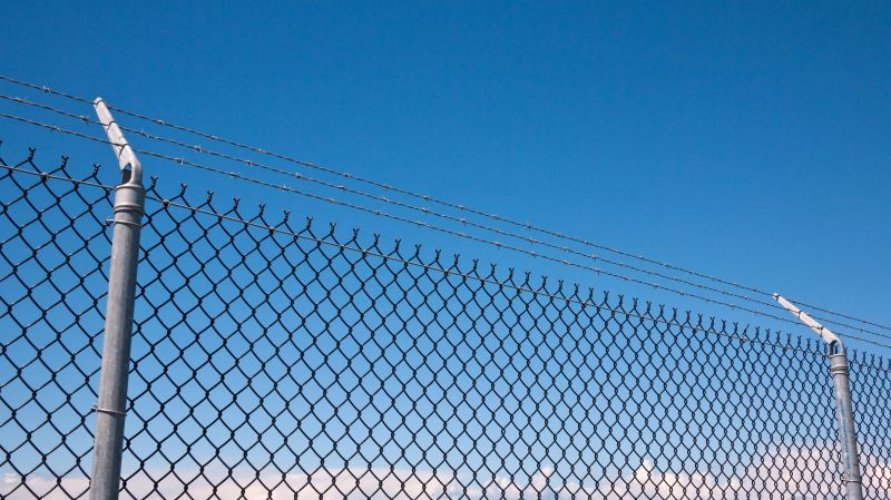 Chain Link Fence with Barbed Wire